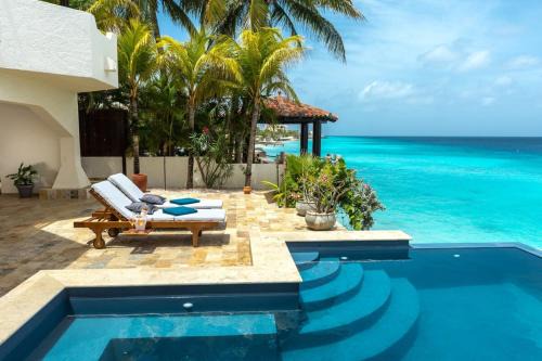 Belnem Villa | Relax at Nirvana Lodge with Private Pool & House Reef