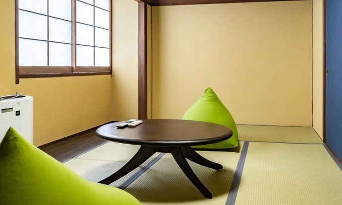 Shinkamigoto Hotel | Discover Tranquil Japanesestyle Room with Tatami Mats