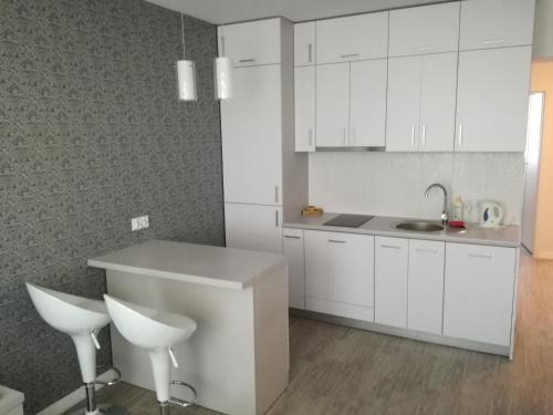 Osiedle Centrum Apartment | Cozy Nordic Apartamenty Suraska with Hot Tub & Dining