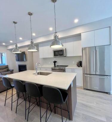 East Kootenay Ski Chalet | Nordix Townhouse: Oceanfront Escape with Pool and Spa