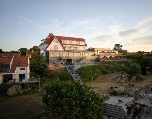 Sandvig Hotel | Nordlandet: Oceanfront Retreat with Private Beach & Great Reviews