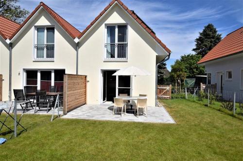 Hohwacht House | Nordlicht Reiher 2 Appat 3: Family-Friendly Stay Awaits