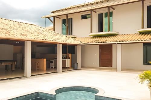 Bom Pastor House | Relax at NossoApê Guarua: Pool, Barbecue & AC Comfort