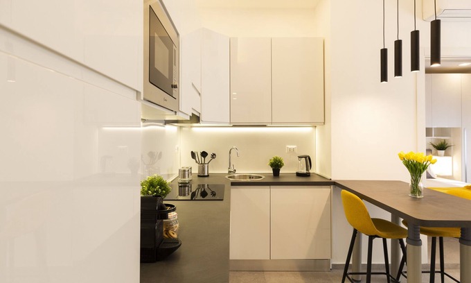 Giambellino Apartment | Top-Rated notaMi in Flower District with Family-Friendly Amenities