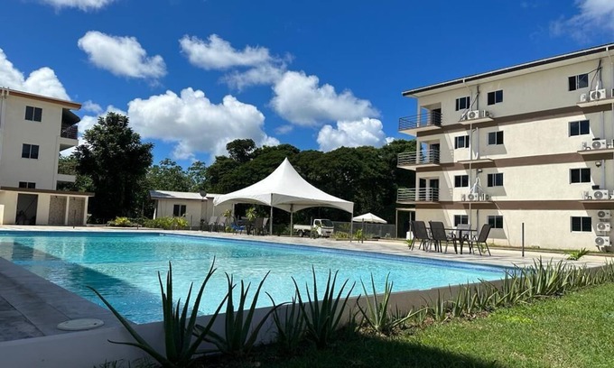 Buccoo Apartment | Nova Haven: Modern Apartment with Pool & Beach Access
