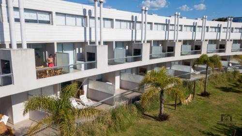 Las Gaviotas Apartment | Relax at Nova Pampa Apart & Spa with Private Beach Access
