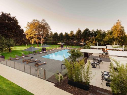 Laxou Hotel | Inviting Novotel Nancy: Pet Friendly with Pool & Ocean View