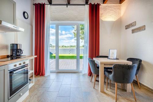 Tannenhausen Apartment | Elegant Nr 8 Dobbe with Garden & Oceanfront Views
