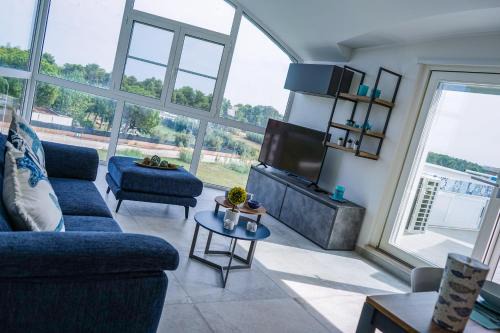 Lido di Campomarino Apartment | Experience NSM Blumarine: Private Beach & Ocean Views