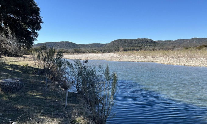 Barksdale Cabin | Discover Nueces River Cabins: Cozy Oak Retreats Await