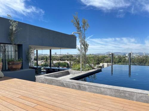 Zapopan Apartment | Modern Stay with Terrace, Pool, and Gym near the Ocean