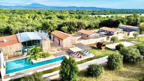 Montsegur-sur-Lauzon Bed & Breakfast | Discover NUIKI Lodges: Oceanfront Retreat with Pool