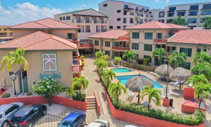 Washington House | Gated Community Villa in Noord with Oceanfront Views