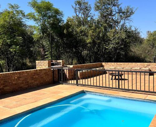 Tshwane Cabin | Relax at Nyala Lodge with Ocean View and Pool Access