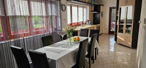 Balassagyarmat House | Discover Nyirjes Vendégház: 4-Star Oceanfront Escape