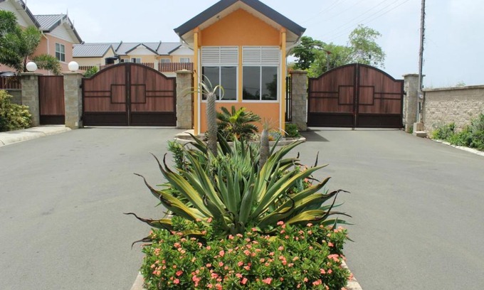 Buccoo Villa | Discover Nzingha's Villa: 4-Star Stay with Pool Access