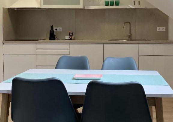 Fertoszentmiklos Apartment | Discover Oázis Apartmanház: Perfect for Families and Pets