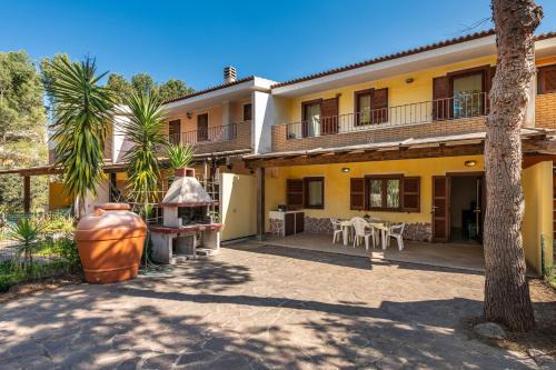 Porto Pino House | Ideal Family Retreat at Oasi Blu Porto Pino