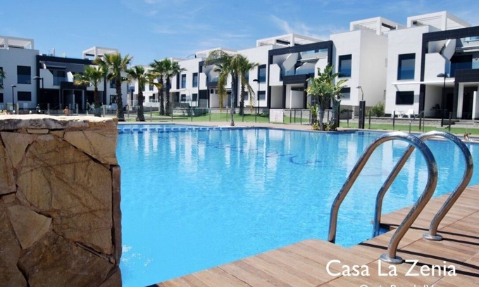 Orihuela Costa Apartment | Idyllic Oasis Beach IV: Oceanfront Retreat with Spa & Pool