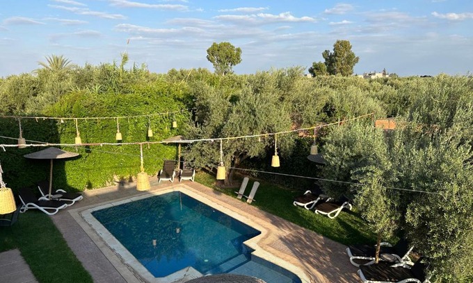 Assouel Hotel | Relax at Oasis Merasi Marrakech with Ocean Views & Pool
