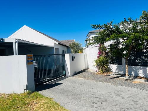 Bloubergstrand House | Top-Rated Oasis of Comfort with Pet & Child-Friendly Amenities