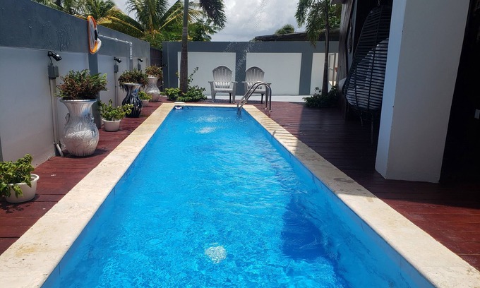 Camaceyes Apartment | Relax by the Oasis Swimming Pool House with Ocean Views