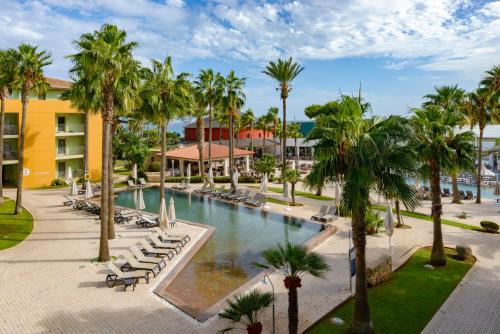 Punta Prima Hotel | Cozy Occidental Menorca: Oceanfront Escape with Spa & Pool