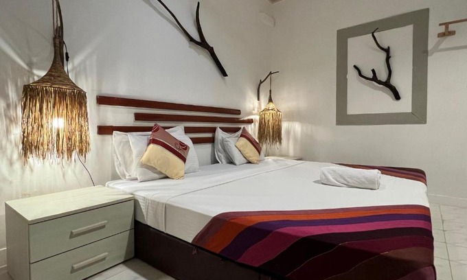 Thulusdhoo Island House | Premier Ocean Cottage Maldives - Guest Rated 10/10!