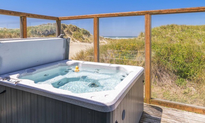 Bayshore House | Beachfront Retreat with Hot Tub & Dog-Friendly Perks