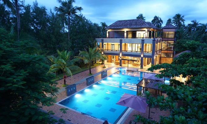 Ngwe Saung Hotel | Relax at Ocean Paradise Resort: Pool, Restaurant & Family Fun