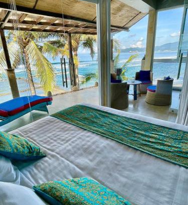 Candi Dasa Apartment | Ocean Suite By A&J - Beachfront Bliss in Candidasa