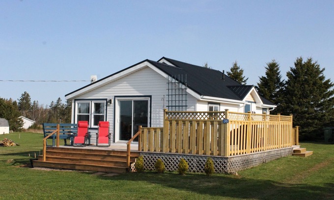 Tryon Cottage | Ocean View Cottage: Family Friendly & Pet Welcoming Retreat