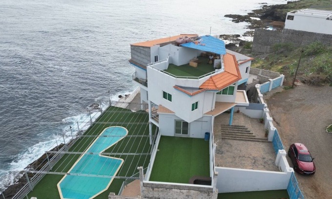 Praia House | Relax at Ocean View House with Pool and Spa Amenities