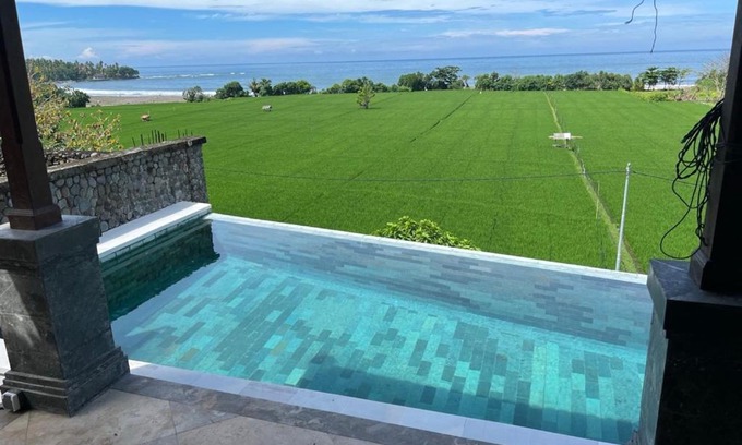 Pekutatan House | Serene Ocean Views with Pet-Friendly Amenities Await