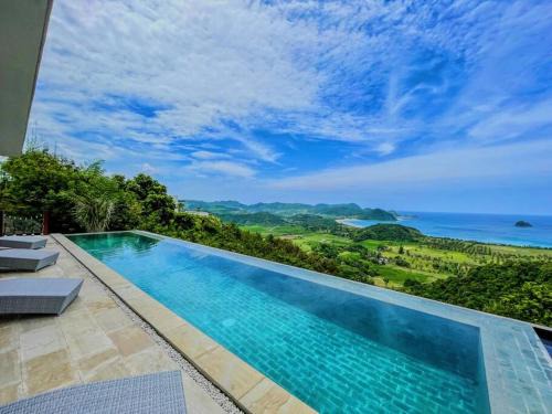 Selong Belanak Villa | Experience Ocean Wave Lombok: 4 BR Villa with Infinity Pool
