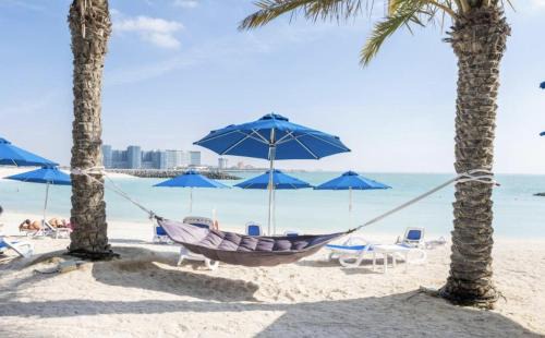 Ras Al Khaimah Apartment | Beachfront Escape at Ocean Whisper Apartment - Al Marjan Island
