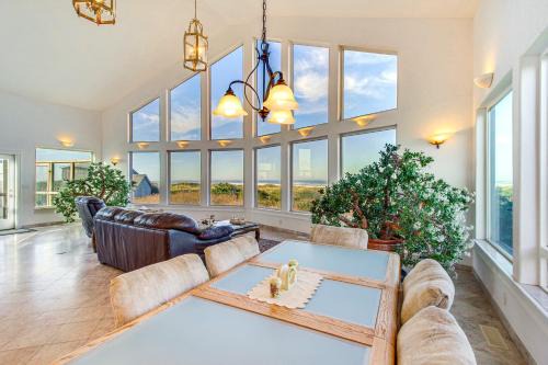 Gold Beach House | Oceanfront Castle with Hot Tub and Games Room Escape