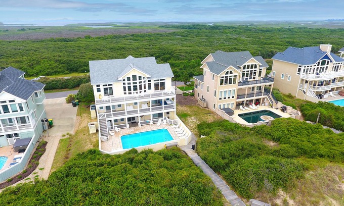 Pine Island House | Discover Cabana Beach: Oceanfront Retreat with Pool & Views