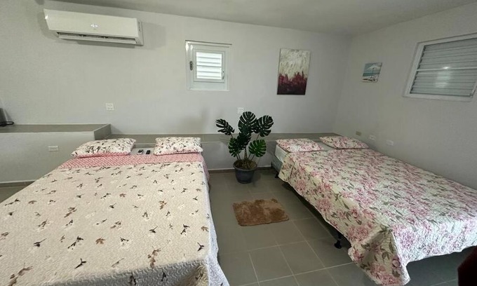 Guayama Apartment | OceanView 2: Family-Friendly Retreat with High Guest Ratings