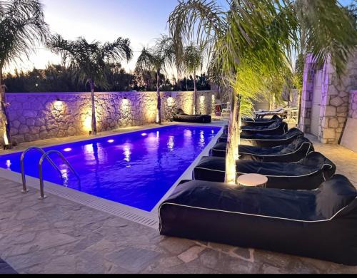 Petaloudes Apartment | Oceanfront Odyssea Sea View Apartment Steps from the Beach