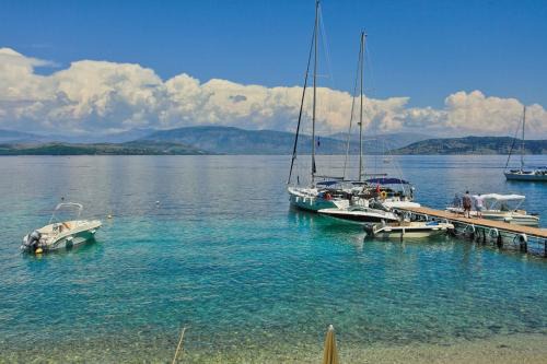 Agni Apartment | Beachfront Olgas Cottage: Family-Friendly Getaway Awaits