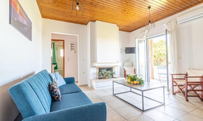 Malevizi Apartment | Beachside Olive Apartment: Child-Friendly Retreat Awaits