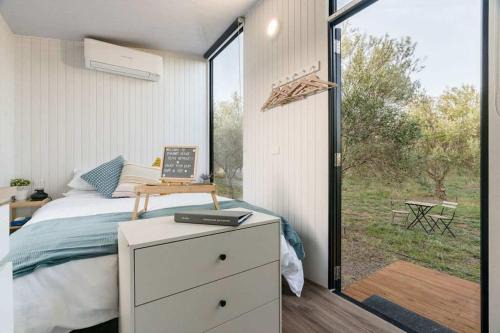 Tresco House | Oceanfront Olive Grove Retreat with Pet-Friendly Amenities