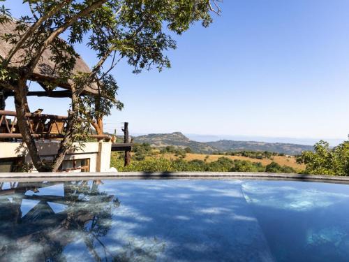 Nelspruit Cabin | Oluchi Lodge: Family-Friendly Retreat with a Pool