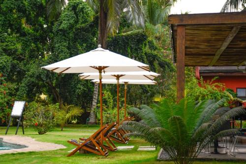 Agua Grande Hotel | Relax at Omali São Tomé: 4-Star Oceanfront Retreat