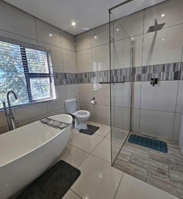 Rustenburg House | Comfortable Stay at Omosa Guest House with Pool Access