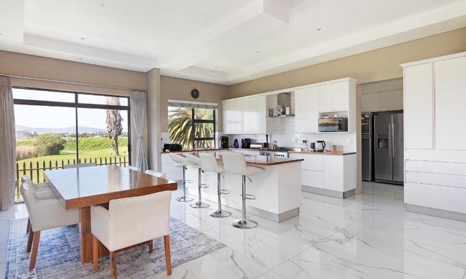 Sunset Beach Villa | Experience Relaxation at On 8th Green Worthing Villa