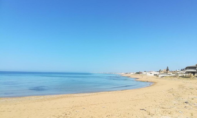 Triscina Apartment | Beachfront Bliss with Ocean Views and Family-Friendly Fun