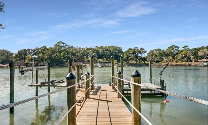 Palm Coast House | Serene Canal Fishing Cabin with Dock and Beach Gear
