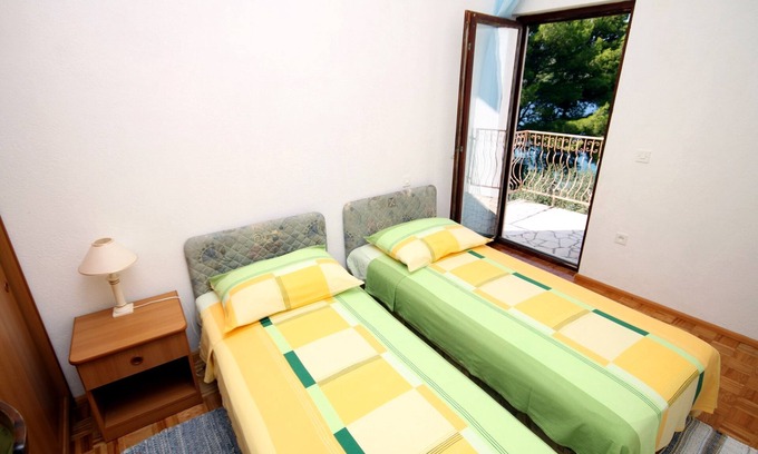 Necujam Apartment | Cozy One Bedroom Apartment Steps from Nečujam Beach